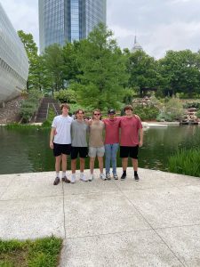 A photo of 5 people in Oklahoma City during the Alpha Sigma Phi Formal